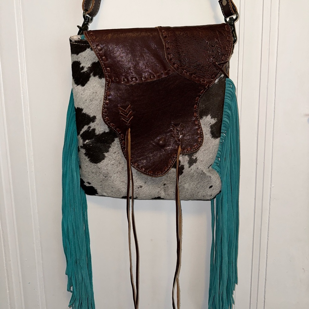 Myra over the shoulder cow hide with fringe purse
